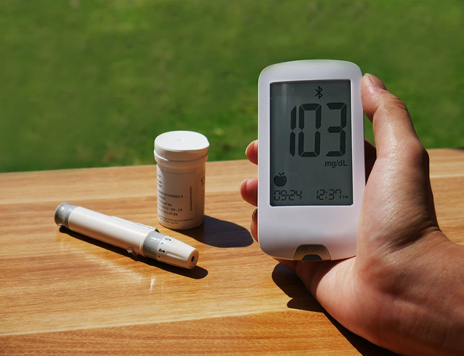 Premium diabetology care setup with glucose monitoring tools and metabolic health dashboard