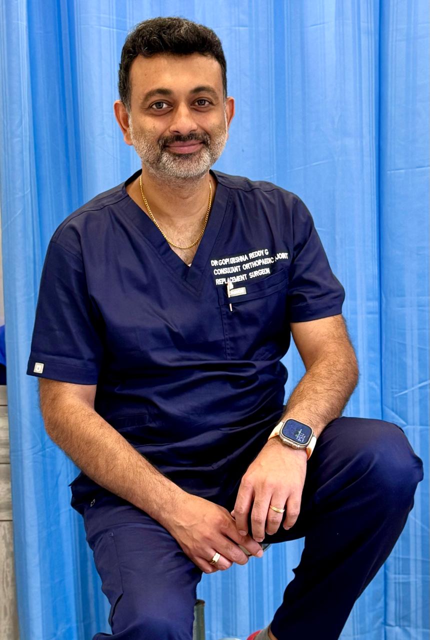 Dr. Gopi Krishna Reddy G in clinical scrubs